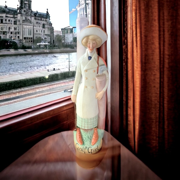 RARE Golf Girl porcelain Figurine. 7 5/8” Tall 3”wide